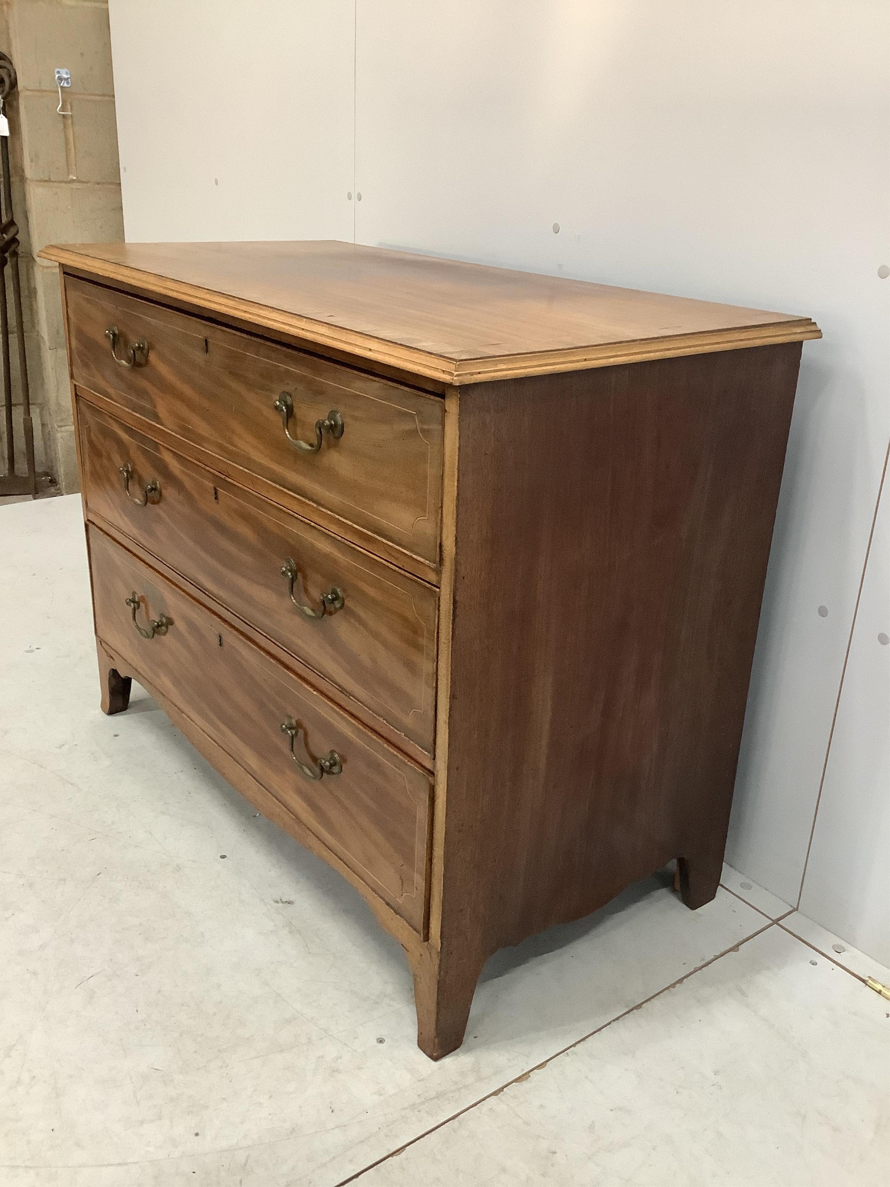 A George III rosewood banded mahogany three drawer chest, width 108cm, depth 55cm, height 84cm. Condition - fair